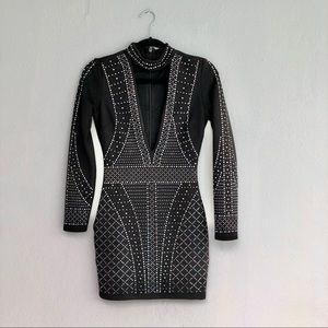Bebe XS long sleeve mini low cut black dress